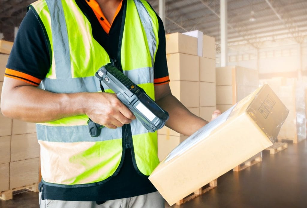 Worker with barcode scanner