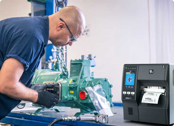 Barcoding Expert looking at barcoding machinery